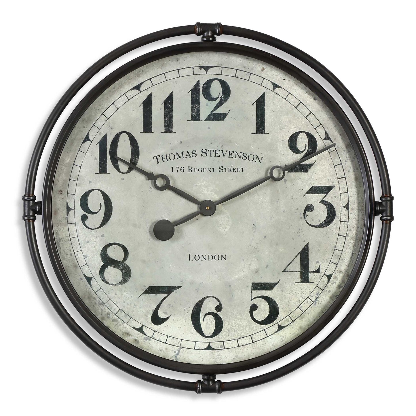Smoke Gray Industrial Iron Frame With An Aged Ivory Clock Face Under Glass. Quartz Movement Ensures Accurate Timekeeping. Requires One "AA" Battery.