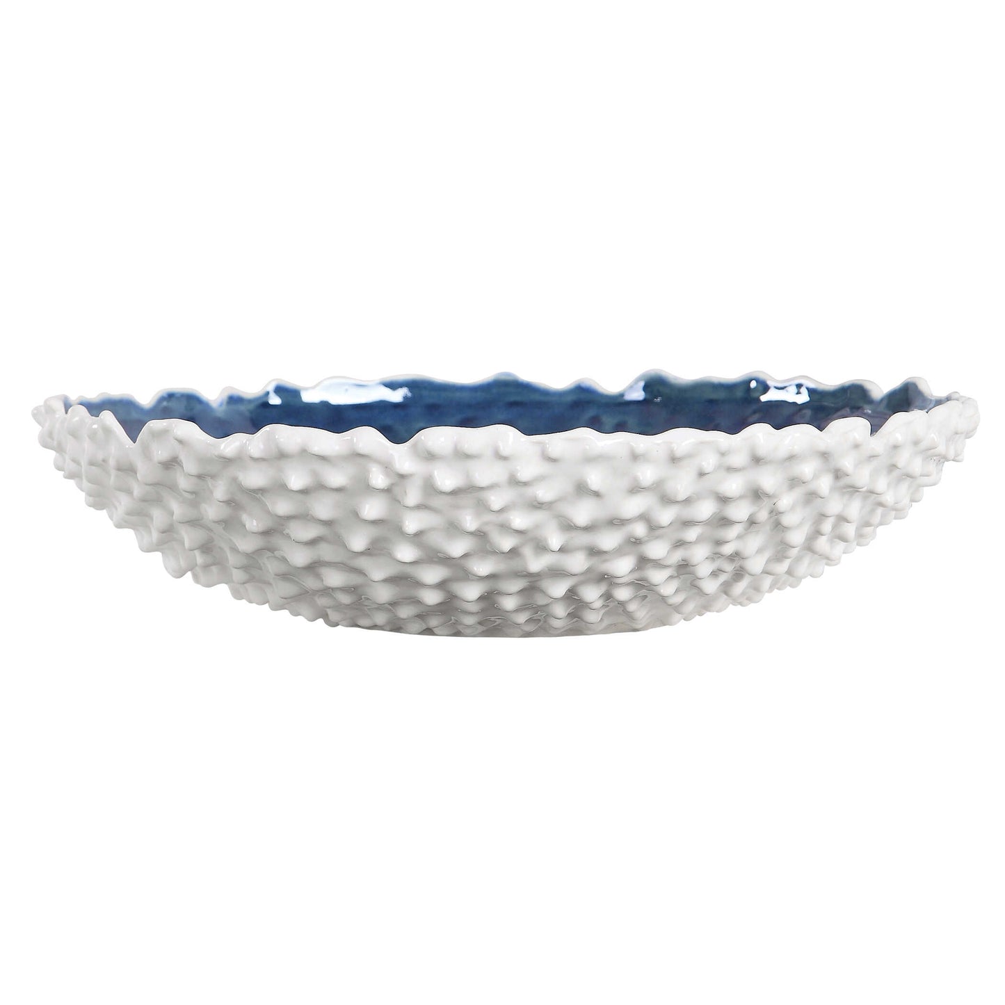 White Ceramic Bowl With Heavy Outer Texture And A Bright Blue Interior Glaze.