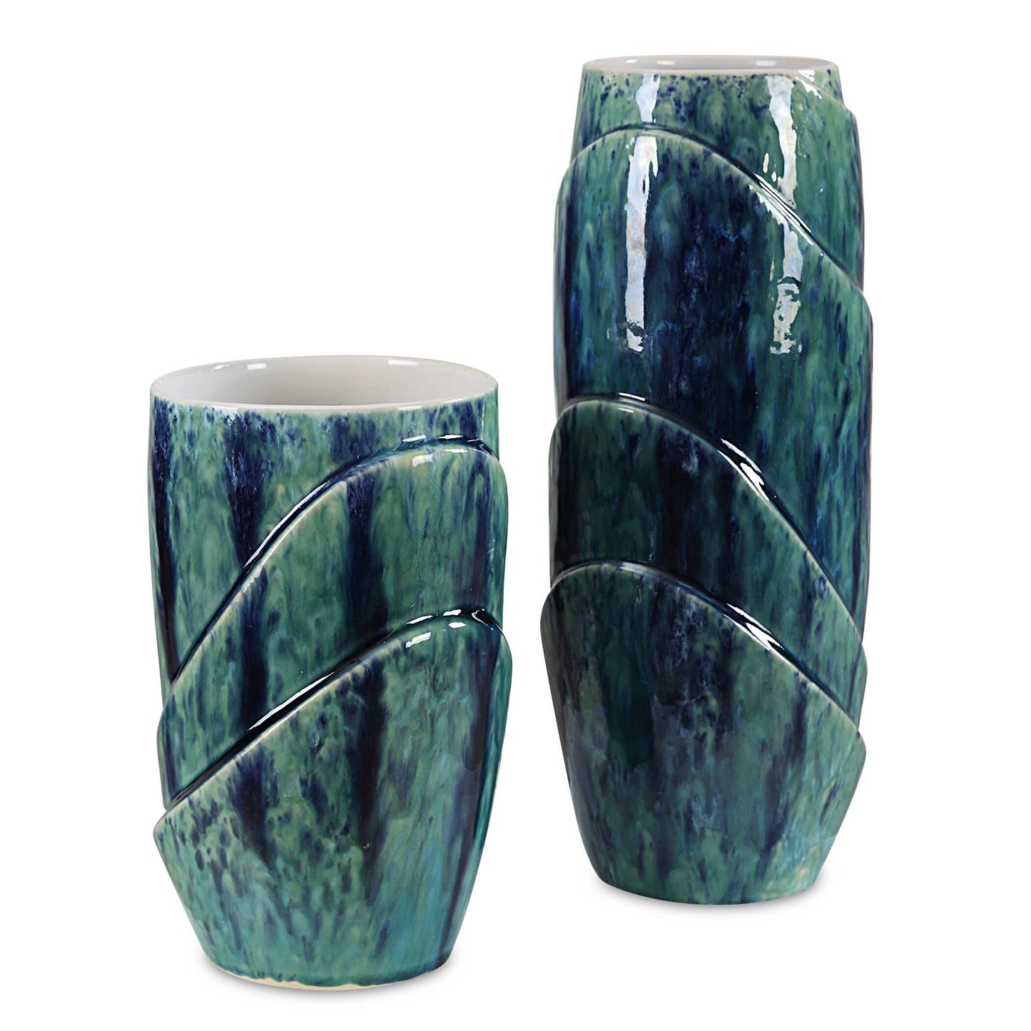 Introducing Our Stunning Set Of Two Ceramic Vases, A Harmonious Blend Of Nature's Hues. Crafted With Care And Adorned In A Captivating Blue And Green Reactive Glaze, Each Vase Boasts A Unique, Organic Pattern. The Interior Is Finished In A Pristine White Glaze, Providing The Perfect Contrast To Showcase Your Blooms. Sizes: S- 6x10x6, L- 6x15x6