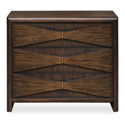 The Bowtie Chest Is A Stylish Piece Crafted From Acacia Wood And Veneer In A Deep Whisky Finish. It Features A Distinctive Bow-tie Design On The Drawer Fronts And Is Met With A Simple Plated Brass Detail In The Middle. With Clean Lines And A Minimalist Aesthetic, This Chest Is A Perfect Addition To Modern And Mid-century Inspired Interiors.