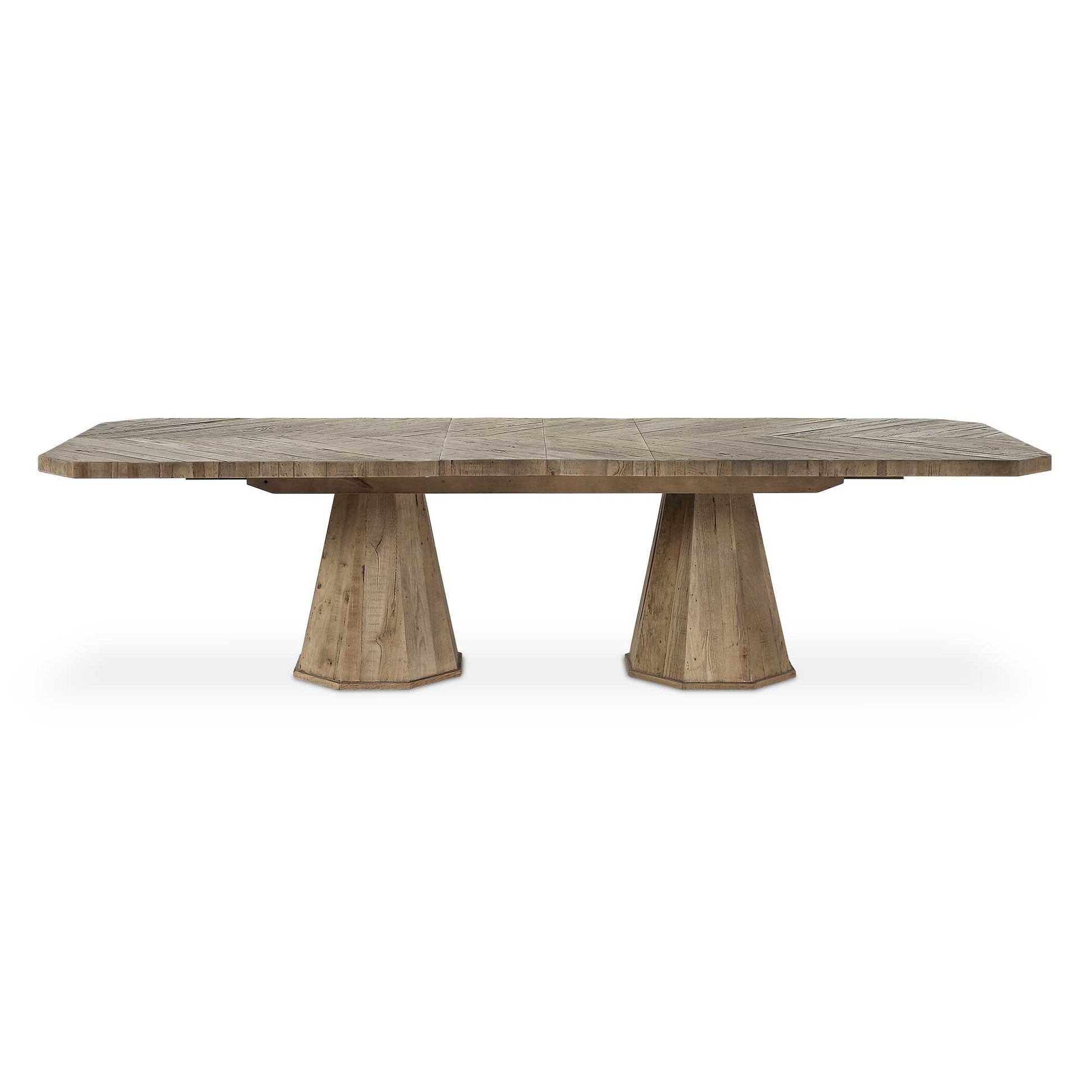 Made From Solid Reclaimed Oak, This Table Features A Beautifully Crafted Herringbone Inlay On The Tabletop, Complemented By Two Striking Geometric Pedestal Bases. The Design Seamlessly Blends Rustic Charm With Contemporary Elegance.
Solid Wood Will Continue To Move With Temperature And Humidity Changes, Which Can Result In Cracks And Uneven Surfaces, Adding To Its Authenticity And Character.
With Two 12" Leaves, This Fixed Base Extension Dining Table Features An Adjustable Dining Surface That Can Vary From