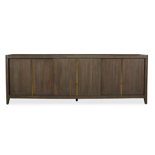 Handcrafted From Mindi Solids And Veneer In A Walnut Finish, This Console Cabinet Is A Beautifully Simple Yet Striking Piece That Will Effortlessly Elevate Any Space. The Sliding Doors Open To Reveal Ample Storage, Combining Style And Functionality.