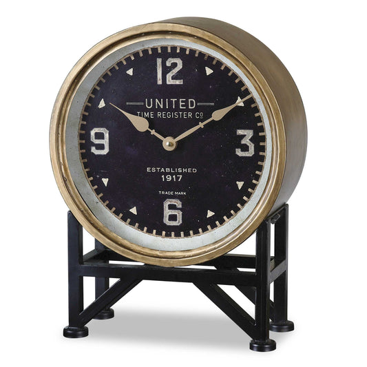 Brass Finished Metal With Aged Black Details. Quartz Movement Ensures Accurate Timekeeping. Requires One "AA" Battery.