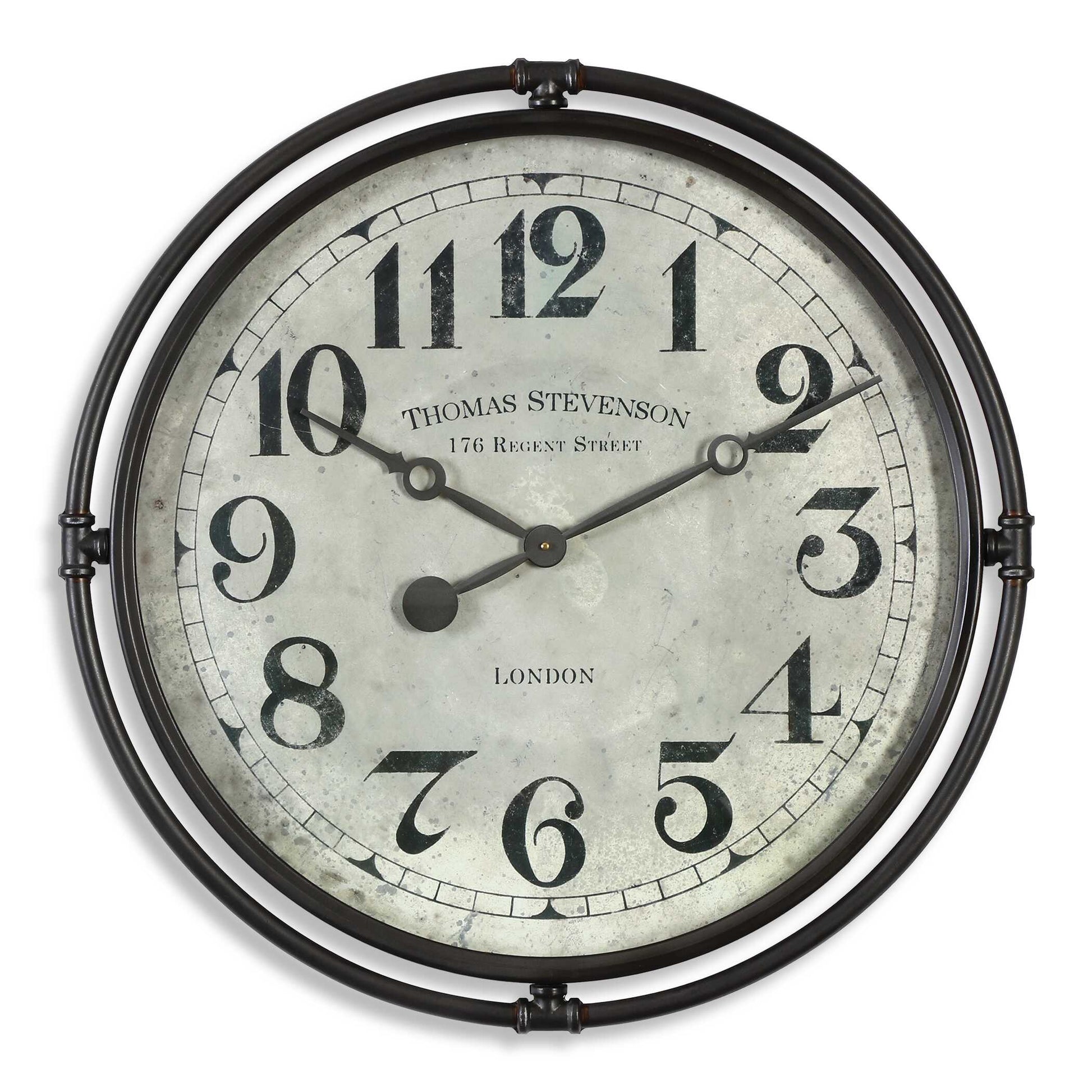Smoke Gray Industrial Iron Frame With An Aged Ivory Clock Face Under Glass. Quartz Movement Ensures Accurate Timekeeping. Requires One "AA" Battery.