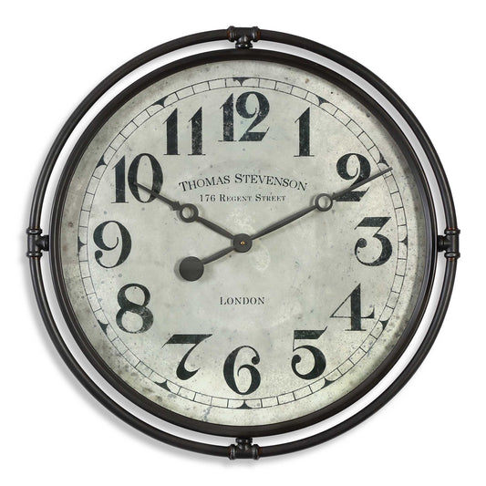 Smoke Gray Industrial Iron Frame With An Aged Ivory Clock Face Under Glass. Quartz Movement Ensures Accurate Timekeeping. Requires One "AA" Battery.