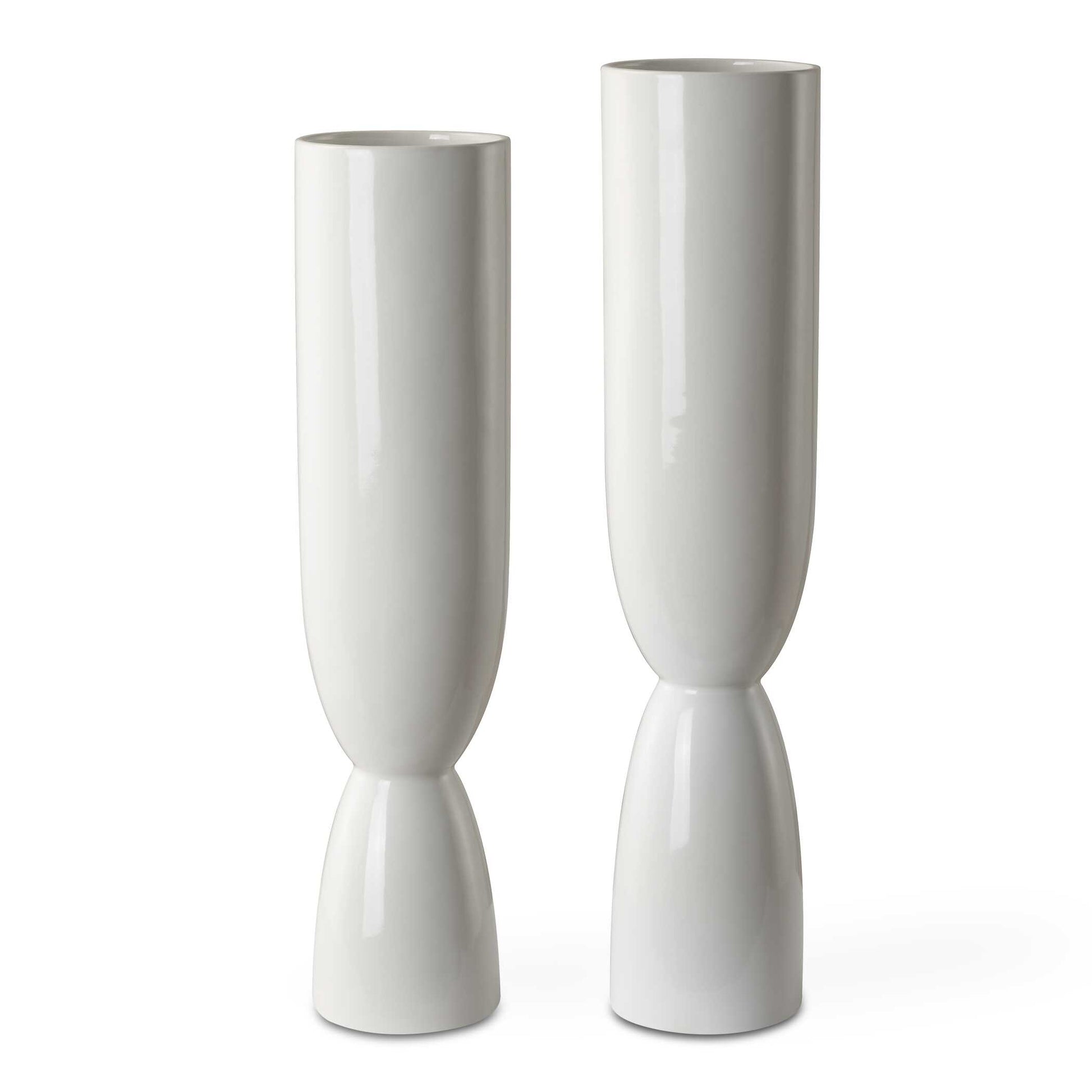 This Set Of Two Ceramic Vases Feature A White Fired Glaze Over Their Unique Shape. Sizes: S-5x18x5, L-5x20x5