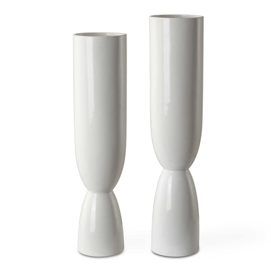 This Set Of Two Ceramic Vases Feature A White Fired Glaze Over Their Unique Shape. Sizes: S-5x18x5, L-5x20x5