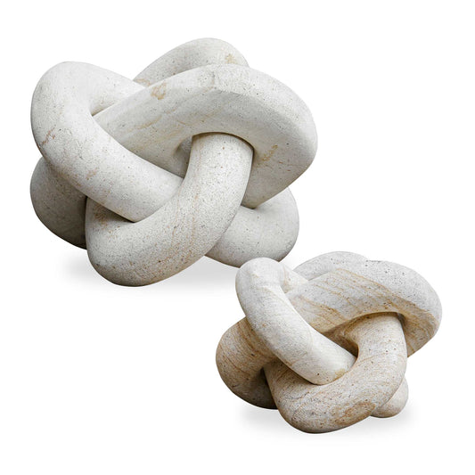 This Exquisite Set Of Two Limestone Link Sculptures Adds A Touch Of Artistic Elegance To Any Space. Each Piece Is Meticulously Crafted From Natural Limestone, Showcasing A Unique Texture And Organic Beauty. Their Intertwined Designs Symbolize Unity And Connection, Making Them Perfect For Display On Shelves, Tables, Or As Part Of A Gallery Wall. Safe For Outdoor Use. Sizes: S-5x5x5, L-7x7x7