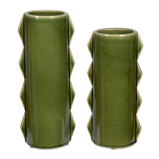 This Dynamic Set Of Two Green Ceramic Vases Showcases A Distinctive Zig-zag Edge Design That Adds A Modern Touch To Your Decor. The Rich Green Finish Creates A Bold Statement, Making Them Perfect For Displaying Fresh Flowers Or As Stunning Decorative Accents. With Their Unique Shape And Vibrant Color, These Vases Effortlessly Elevate Any Space, Whether On A Dining Table, Shelf, Or Mantel. Safe For Outdoor Use, But Protection From Freezing Temperatures Is Recommended. Sizes: S-6x12x5, L-6x14x5
