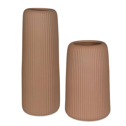 This Stylish Set Of Two Light Brown Ribbed Vases Features A Sleek Cylindrical Design That Adds A Modern Touch To Any Decor. The Textured Ribbing Creates Visual Interest And Depth, Making Them Perfect For Showcasing Fresh Flowers Or As Striking Decorative Accents. Safe For Outdoor Use, But Protection From Freezing Temperatures Is Recommended. Sizes: S-10x16x10, L-8x22x8