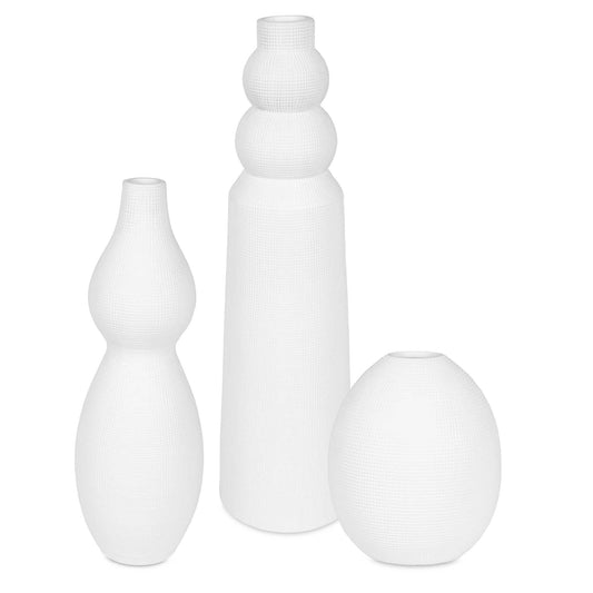 This Striking Set Of Three White Ceramic Vases Features Unique Shapes That Create A Bold And Contemporary Statement In Any Space. Each Vase Showcases A Distinct Silhouette, Adding Visual Interest And Artistic Flair To Your Decor. Safe For Outdoor Use, But Protection From Freezing Temperatures Is Recommended. Sizes: S-6x7x6, M-5x14x5, L-6x19x6