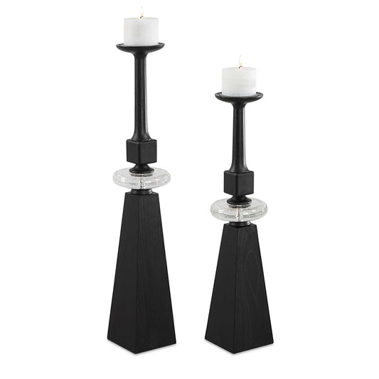 These Tall Floor Candleholders Combine Modern Elegance With Rustic Charm, Crafted From Stained Black Wood And Accented By A Distinctive Seeded Glass Ring. The Sleek, Tall Design Creates A Striking Visual Statement, Perfect For Illuminating Any Room With Warmth And Ambiance. Two 4x3 White Candles Included. Sizes: S-7x30x7, L-7x36x7
