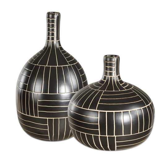 Elevate Your Home Decor With These Striking Black Ceramic Vases, Featuring A Sleek Geometric Design With Contrasting Ivory Lines. Perfect For Modern And Contemporary Spaces, These Handcrafted Statement Pieces Add Sophistication And Artistic Flair To Any Setting. Sizes: S-10x10x10, L-8x14x8