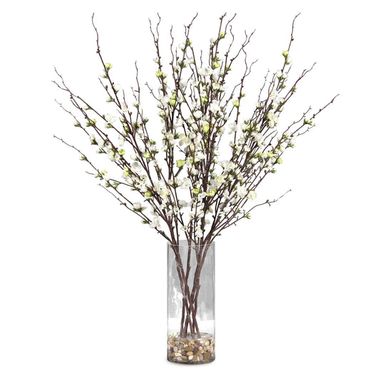 Effortlessly Arranged As If Freshly Harvested, These Quince Branches Exemplify The True Characteristics Of Live Blooms. Varying In Stages Of Openness, Cream Buds Are Accented By Natural Rocks In A Clear Glass Vase.