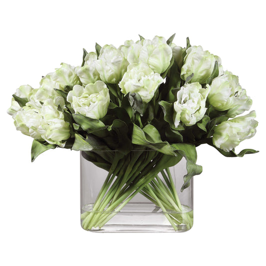 Featuring A Dramatic Spread Of White Tulips, Meticulously Placed Into An Oval Glass Vase Complete With Faux Water.