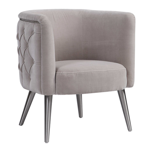 This Stylish Barrel Chair Features A Plush Diamond Button Tufted Surround In A Luxurious Champagne Velvet, Lined With Antique Nickel Nail Head Trim, On Metal Tapered Dowel Legs Finished In Brushed Nickel.