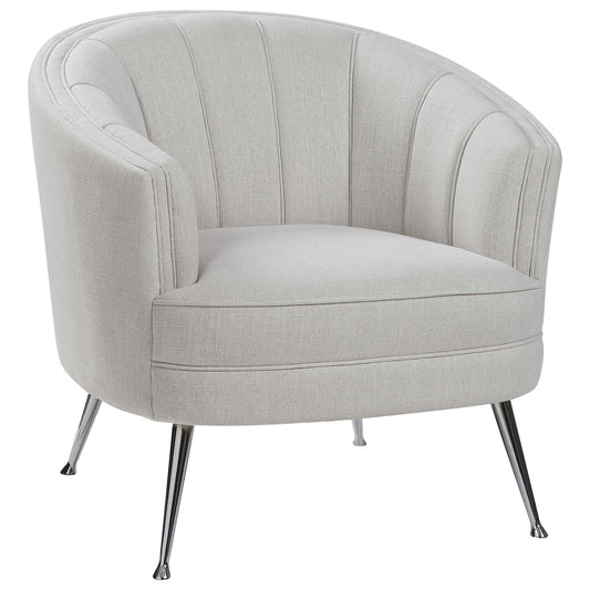 The Perfect Balance Of Retro And Modern Style, This Welt Trimmed Barrel Back Chair Is Covered In A Casual Light Tan Fabric With Channel Tufting And Polished Nickel Tapered Legs.
