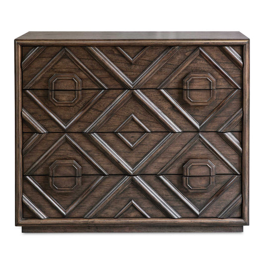 With A Transitional Deep Walnut Finish Over Mindi Veneer, Naturally Distressed And Hand Rubbed To Expose Natural Undertones, This Four Drawer Chest Features An Updated Geometric Carved Molding Front Over A Floating Plinth Base.