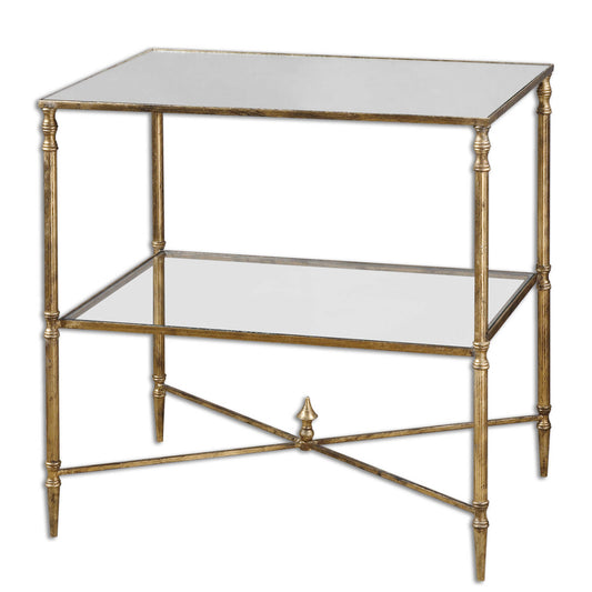 An Elegant Silhouette In Iron With A Cross Stretcher Accent Finished In Gold Leaf With Heavy Antiquing. Top Is Reinforced Mirror And Gallery Shelf Is Clear Tempered Glass.