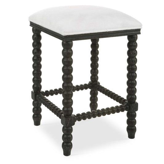 A Stylish And Classic Counter Stool Featuring Spindle Turned Legs And Carved Trim Finished In A Stylish Black Ceruse Stain. Plush Seat Is Tailored In A Crisp White Performance Fabric.