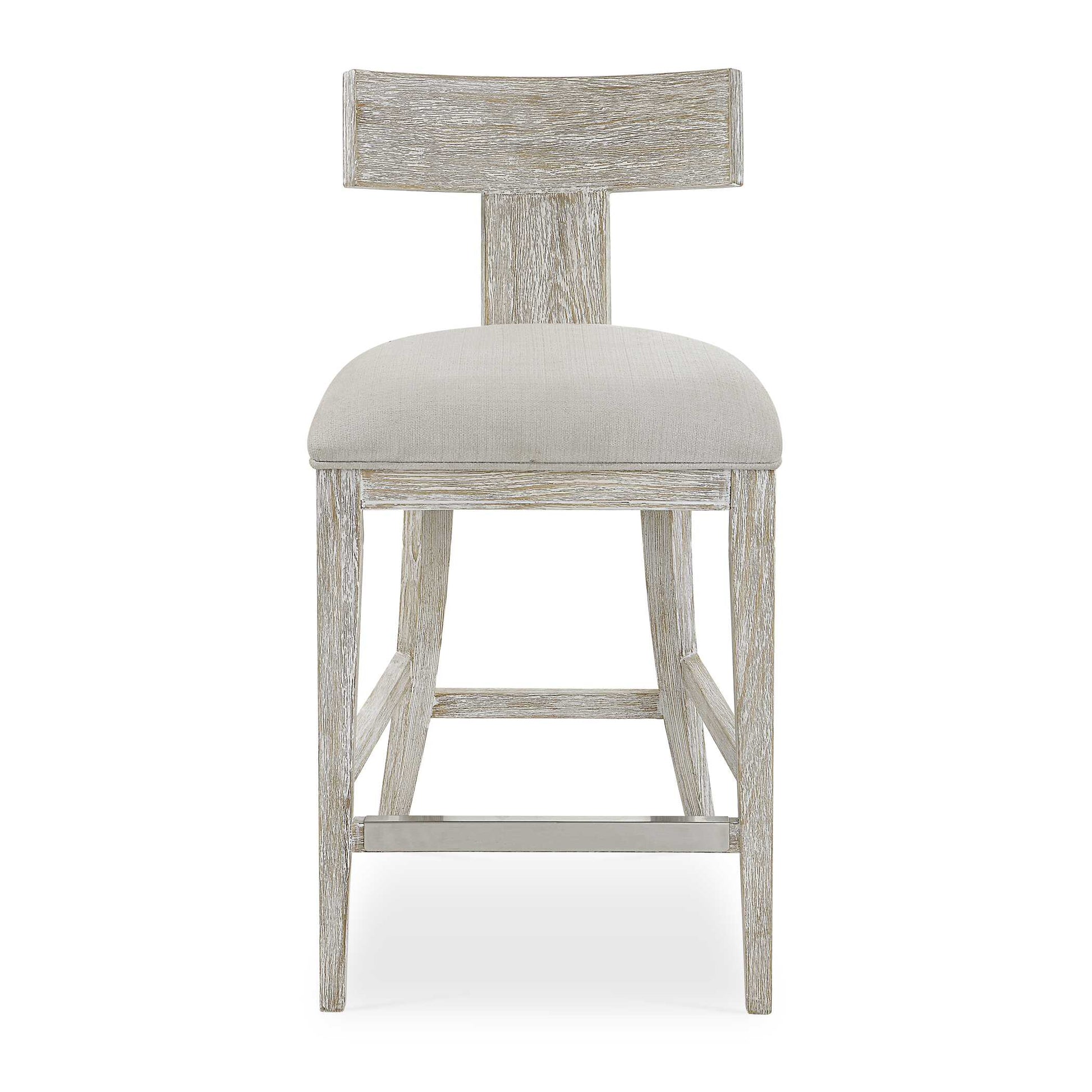 This Modern Take On A Klismos Chair Features A Curved Wood Frame In A Whitewashed Finish, With Wire Brushed Details Revealing Natural Pine Wood Undertones. Paired With A Stone White Slubbed Performance Fabric Cushion.
