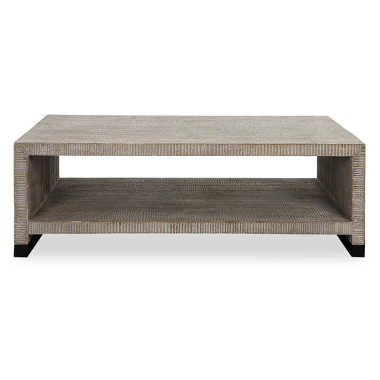 This Casual Coffee Table Provides Ample Display Space And Creates A Rustic Feel With Its Natural Wood Finish And Intricate Carved Details, Highlighted By A White Washed Glaze. Steel Feet Are Finished In A Natural Aged Black.