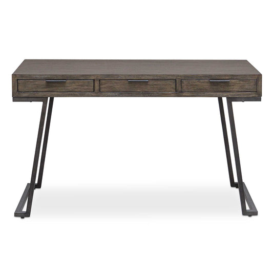 The Comrade Desk Provides A Perfect Spot For Ample Productivity. The Desk Is Finished In A Mango Wood Veneer With Light Gray Glazing And Natural Wood Undertones, Supported By A Metal Base In Aged Steel. Features Three Drawers With Coordinating Metal Tab Drawer Pulls.