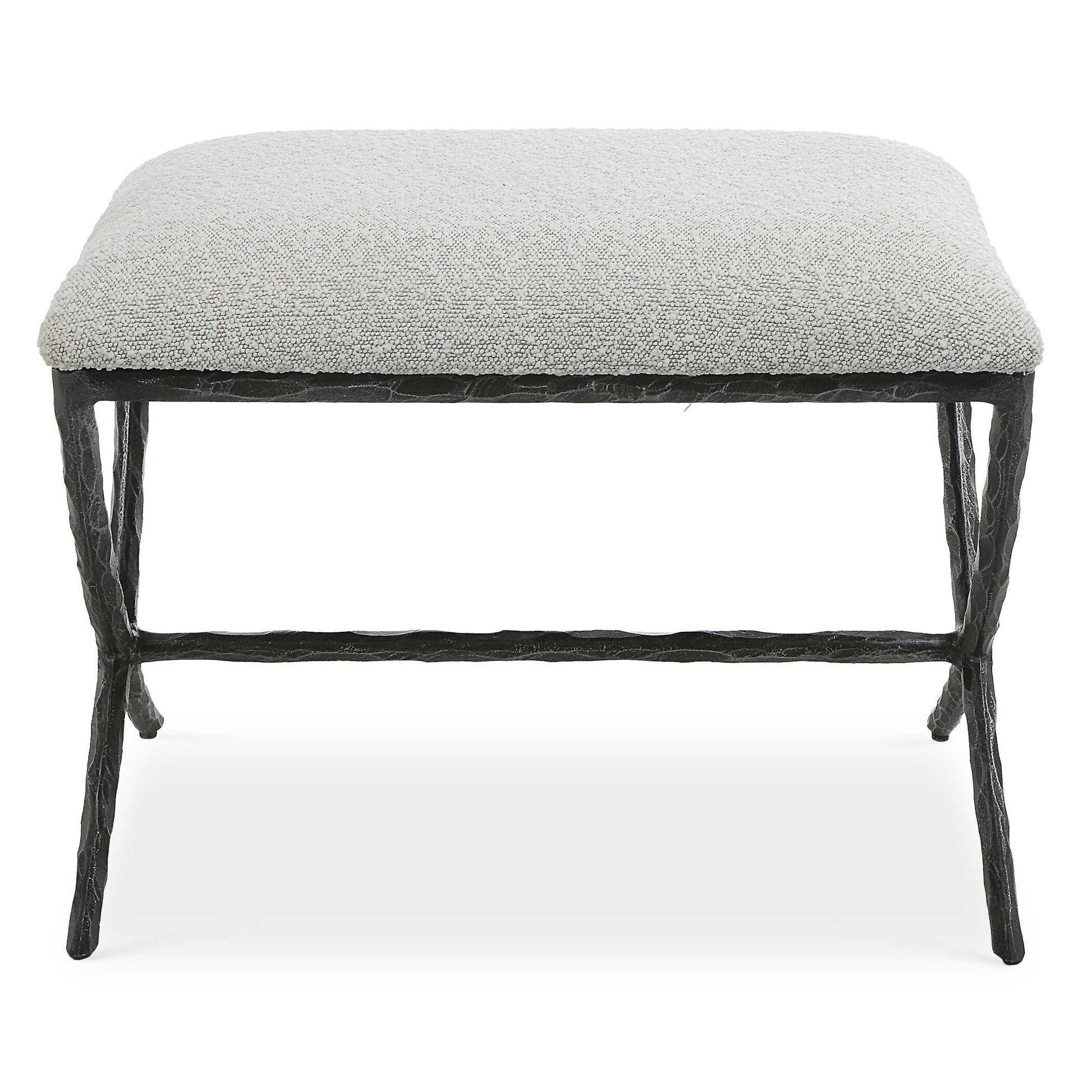 With Clean Contemporary Lines, This Cast Iron Base Features A Chiseled Texturing With A Distressed Charcoal Finish. Topped With An Upholstered Seat In A Casual Ivory And Light Gray Boucle Fabric.