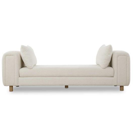 Exceptional Comfort With Dual Functionality As An Oversized Bench Or Even A Small Day Bed, Featuring Chunky Curves And Dowel Feet In Light Oak, With Two Accent Pillows. Upholstered In A Finely Textured Faux Sheepskin In Soft Ivory.