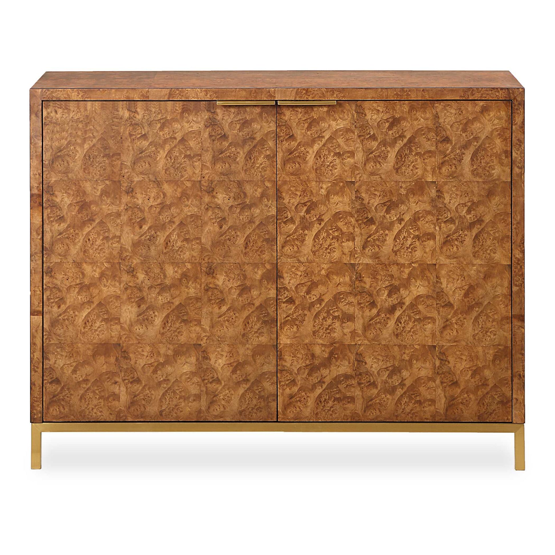 This 2 Door Cabinet Is Meticulously Crafted With A Rich Burl Veneer, Showcasing A Captivating Geometric Square Pattern That Adds Depth To Its Surface. The Cabinet Is Framed By Gold Finished Metal Legs And Coordinating Hardware That Enhances Its Luxurious Appeal.