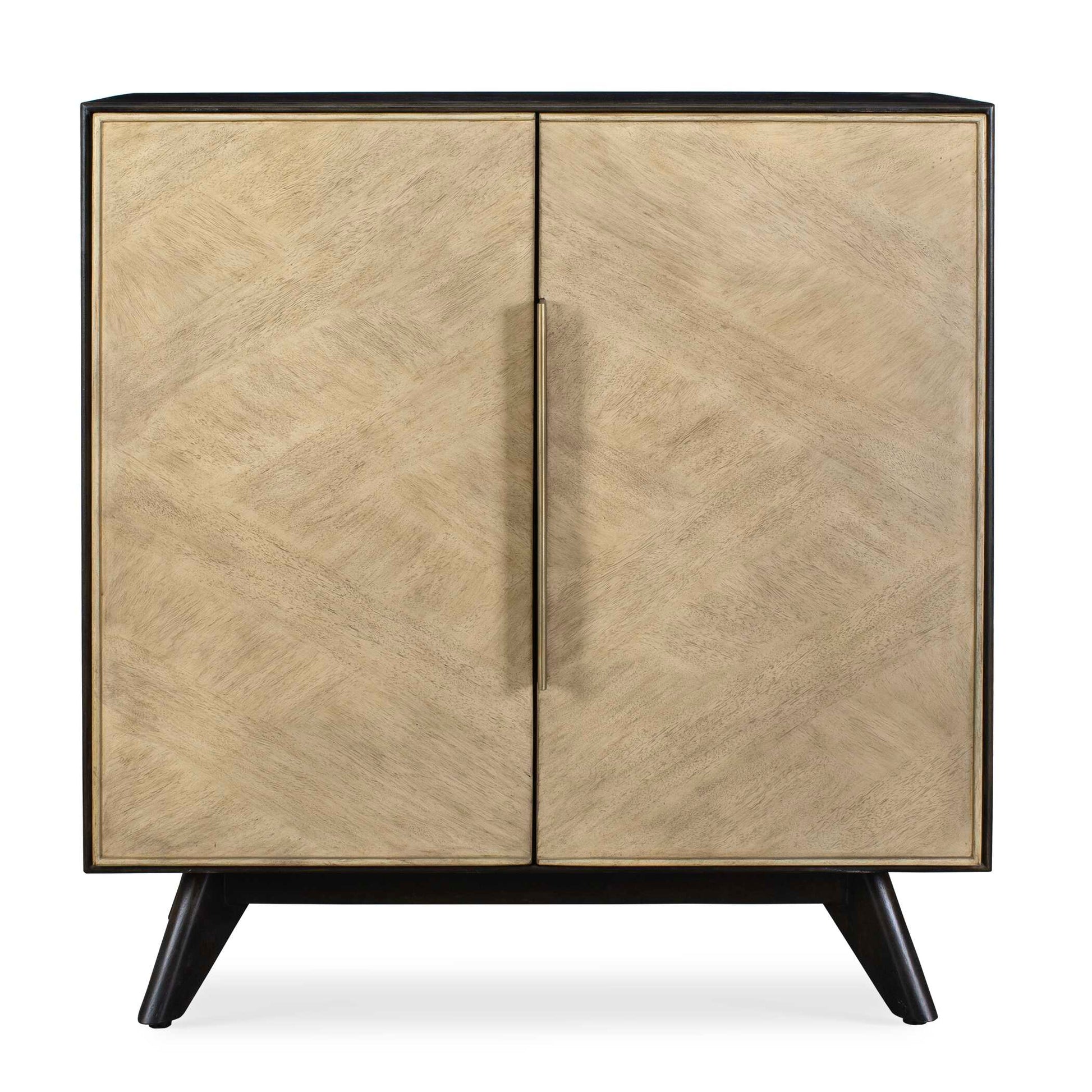This 2 Door Cabinet Comprised Of Mango And Java Wood Veneers Presents A Striking Contrast With Its Sleek Dark Walnut Finished Case And Light Toned Alternating Grain Direction Doors. Creating A Dynamic Juxtaposition That Adds Depth And Visual Intrigue, Finished With Elegant Gold Finished Hardware. Has Soft Close Hinges.