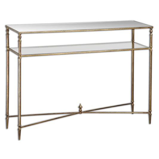 An Elegant Silhouette In Iron With A Cross Stretcher Accent Finished In Gold Leaf With Heavy Antiquing. Top Is Reinforced Mirror And Gallery Shelf Is Clear Tempered Glass.