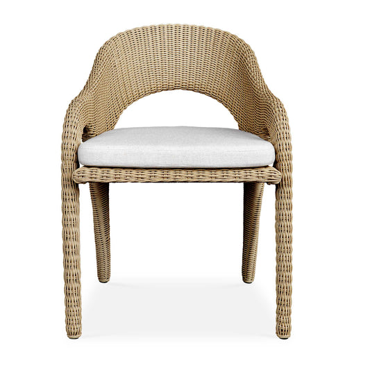 The Kavali Dining Arm Chair Showcases A Curvaceous Frame, Crafted From Hand Wrapped, All-weather Wicker In A Natural Honey Finish. The Plush Cushion Is Upholstered In Oyster White Solution Dyed Acrylic Fabric That Is Constructed To Withstand The Moisture And Dirt That Comes With Outdoor Use.