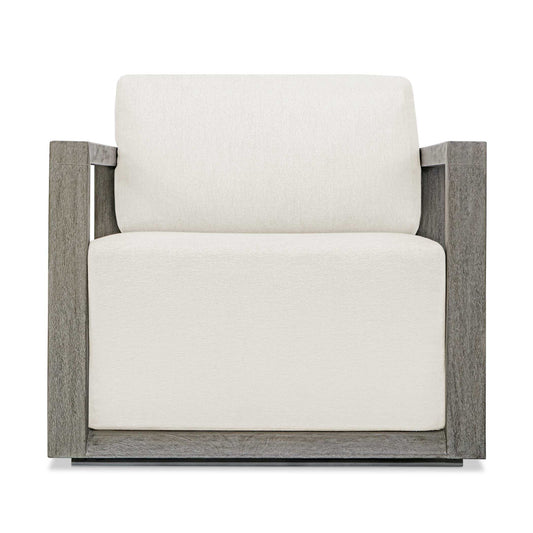 The Remsen Outdoor Lounge Chair Features A Striking Architectural Frame With Smooth Interior Curves That Give A Sculptural Presence. Constructed Of Solid Mahogany Wood In A Weathered Gray Finish With Wire-brushed Details. Its Generously Cushioned Floating Seat, Upholstered In An Oyster White Solution Dyed Acrylic Fabric, Is Designed To Withstand The Moisture And Dirt That Comes With Outdoor Use. Solid Wood Will Continue To Move With Temperature And Humidity Changes, Which Can Result In Cracks And Uneven Sur