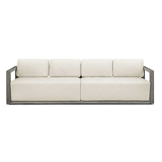The Remsen Outdoor Sofa Features A Striking Architectural Frame With Smooth Interior Curves That Give A Sculptural Presence. Constructed Of Solid Mahogany Wood In A Weathered Gray Finish With Wire-brushed Details. Its Generously Cushioned Floating Seat, Upholstered In An Oyster White Solution Dyed Acrylic Fabric, Is Designed To Withstand The Moisture And Dirt That Comes With Outdoor Use. Solid Wood Will Continue To Move With Temperature And Humidity Changes, Which Can Result In Cracks And Uneven Surfaces, A