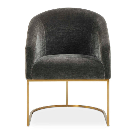 The Hanni Dining Chair Features A Sleek, Curved Steel Frame In A Brass Plated Finish And A Barrel Style Seat Upholstered In Charcoal Polyester Velvet.