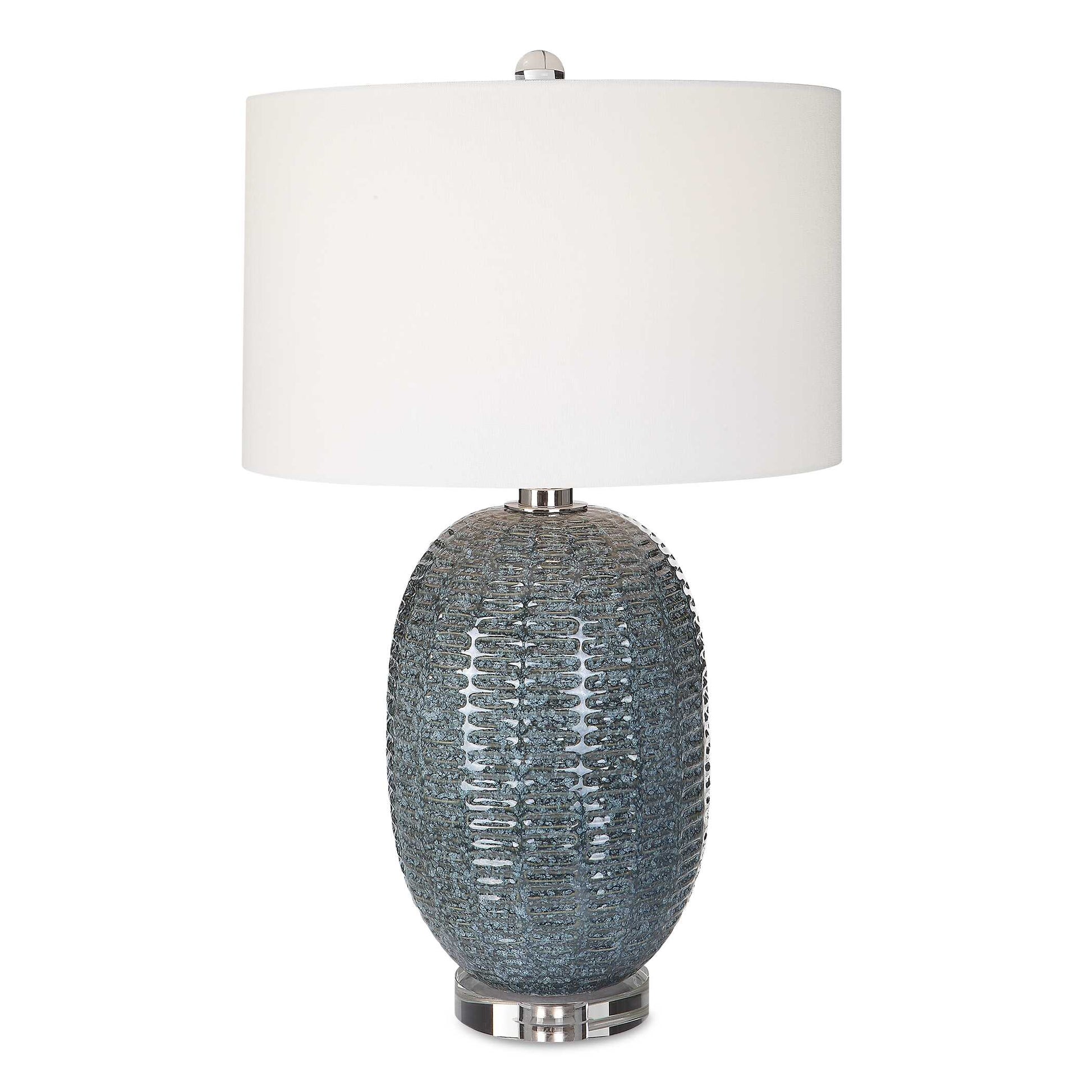 This Ceramic Table Lamp Features A Repeating Geometric Motif Finished In A Mottled Blue-green Glaze, Accented With Polished Nickel Details And A Thick Crystal Foot.