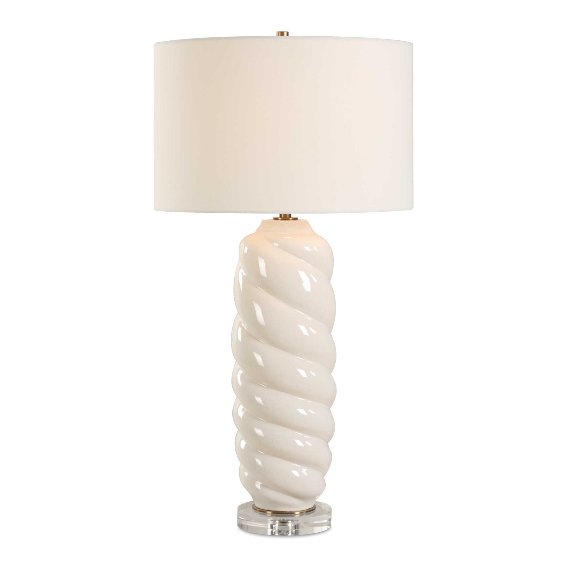 The Anneli Table Lamp Features A Gloss White Ceramic Base In A Tapered Swirl Design For A Timeless Coastal Appeal. The Addition Of A Crystal Foot And Antique Brass Plated Details Creates A Truly Unique And Eye-catching Look.