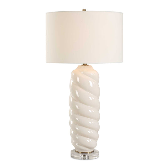 The Anneli Table Lamp Features A Gloss White Ceramic Base In A Tapered Swirl Design For A Timeless Coastal Appeal. The Addition Of A Crystal Foot And Antique Brass Plated Details Creates A Truly Unique And Eye-catching Look.