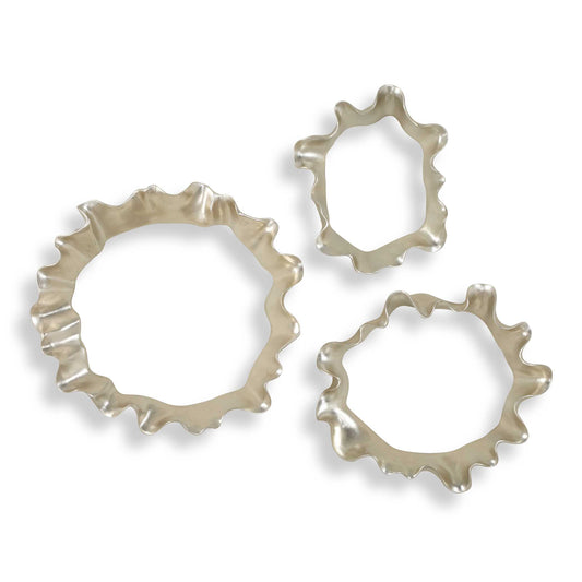 A Captivating Trio Of Sculpted Resin Wall Decor In A Warm Silver Leaf Finish. The Undulating Forms Create A Fluid Motif, Reminiscent Of Ripples In Water. Sizes: Sm-11x13x3, Med-14x16x4, Lg-18x19x3